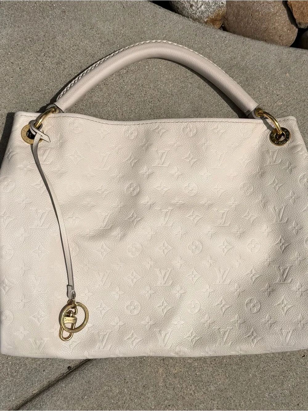 Authentic Louis Vuitton Cream Embossed Leather Hobo with Gold Hardware - Cream